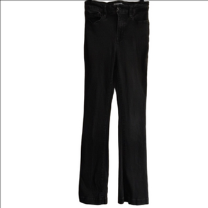 Good American Black Boot Cut / Flare Denim. Size 4/27. Some Stretch. Small Flaw.